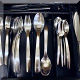 K09. Stainless flatware. 